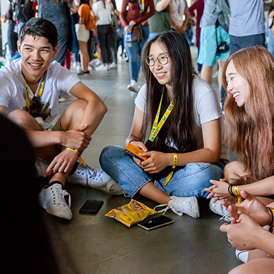 Students sitting in circle laughing